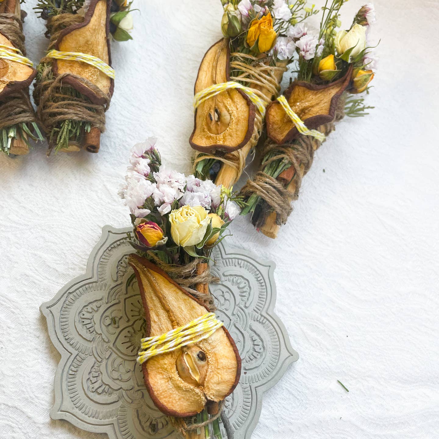 PEAR, PALO SANTO, JUNIPER AND CINNAMON SMUDGE STICK